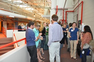 Fellows and Interns gather during a break and chat about the conference.