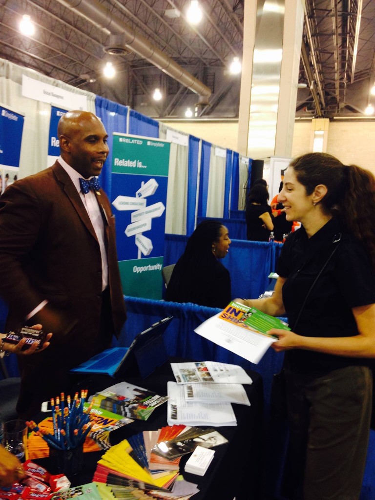 Omar Eaton-Martinez assists a prospective intern.