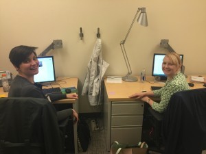 Cat-and-Bailey-at-their-workstations-e1458582391660-300x225